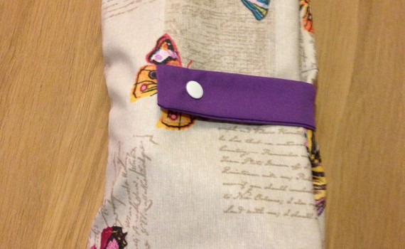 Windeltasche geschlossen mit Schmetterlingen