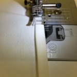 Mit doppeltem Einschlag umnähen