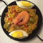 Vegetarische Paella mit Gambas